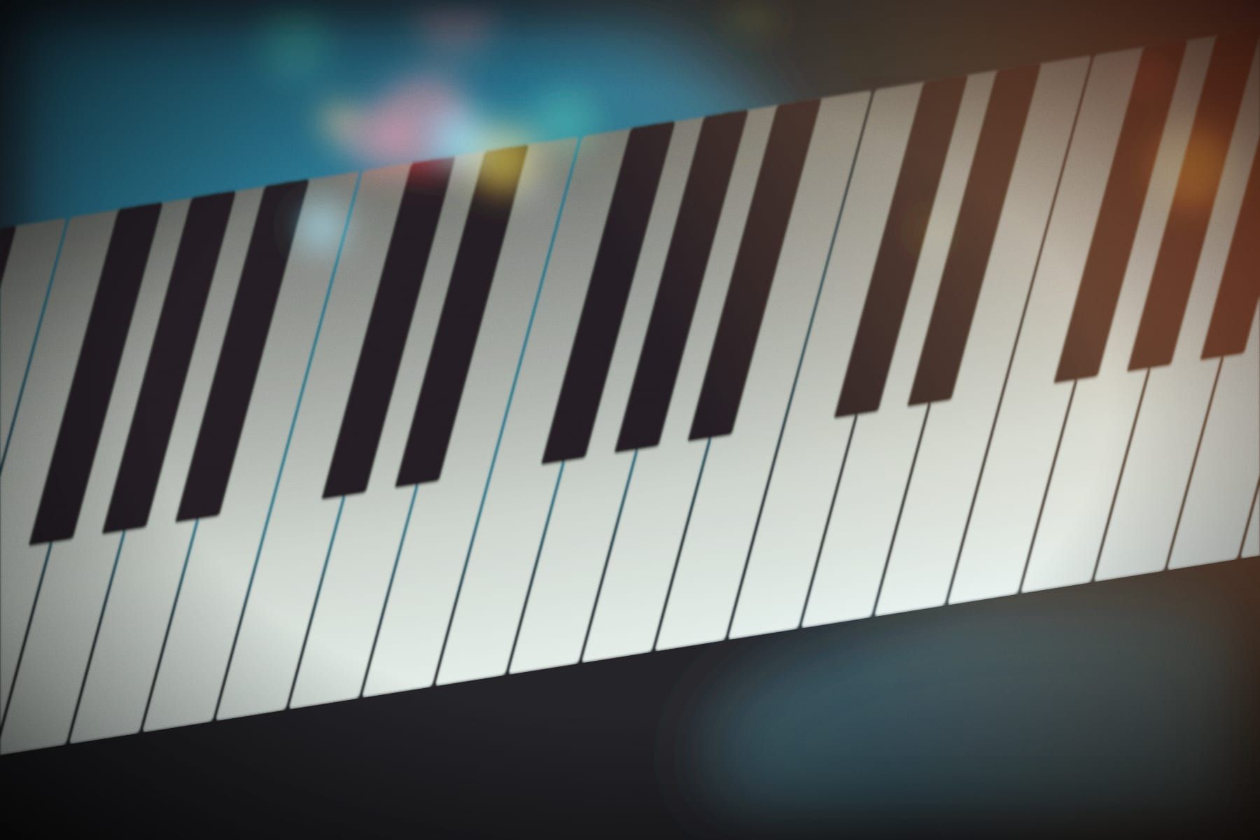 A keyboard lit in teal