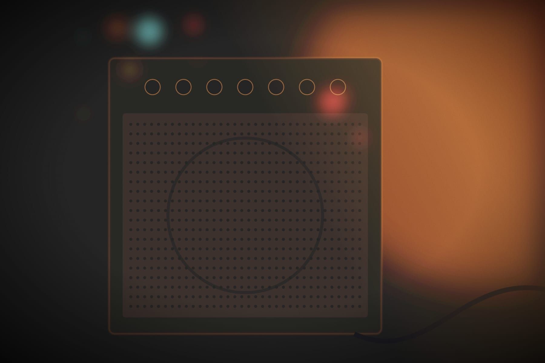 A guitar amplifier in warm light