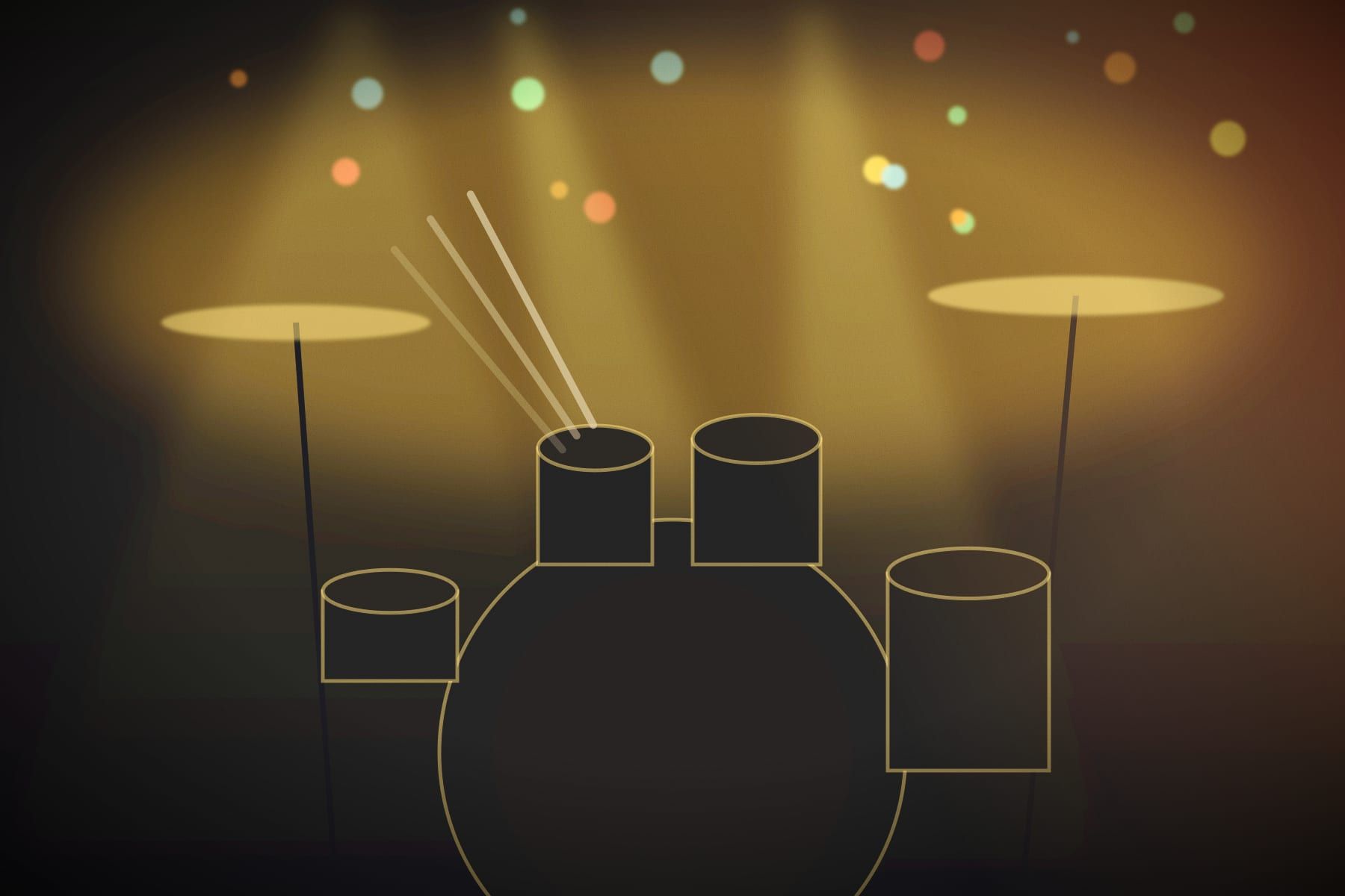 A drum kit under yellow stage lights